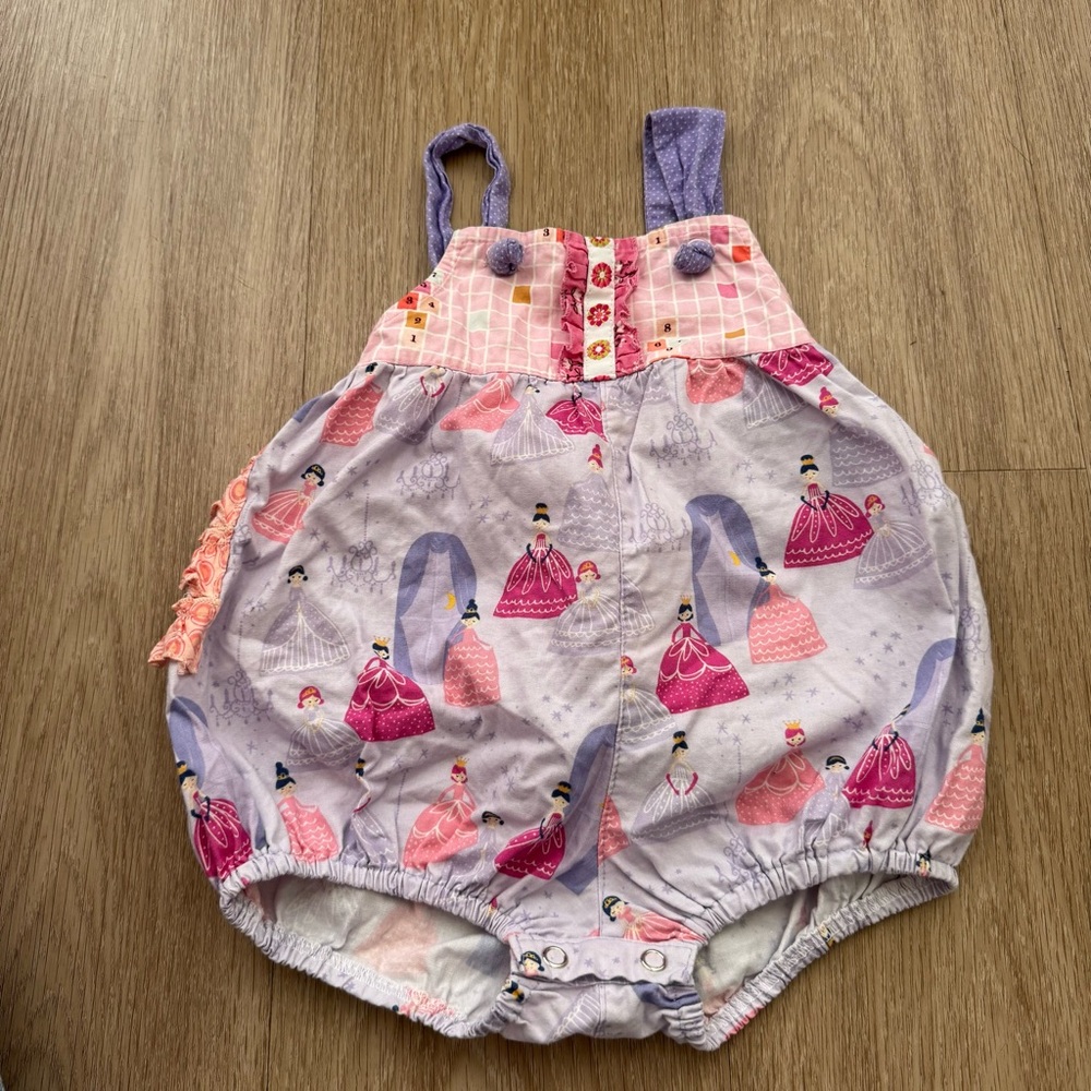 Platinum Brand Ruffled Baby Romper in Lavender & Pink